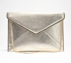 Effortlessly elegant, this chic clutch boasts six credit card slots to keep your expertly organized (without a bulky wallet to tote around). Plus, the chain shoulder strap provides a hand-free option. From Rebecca Minkoff. Classic Office Clutch With Chain Strap, Classic Party Bag With Chain Detail, Classic Party Bag With Chain, Chic Envelope Wallet On Chain For Everyday, Chic Shoulder Clutch With Card Slots, Chic Clutch Shoulder Bag With Card Slots, Trendy Gold Bag With Card Slots, Gold Clutch With Gold-tone Hardware For Office, Formal Clutch Wallet On Chain With Card Slots