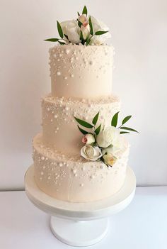 Wedding Cakes With Pearls And Flowers, Pearl Detail Wedding Cake, Pink Pearl Wedding Cake, Wedding Cake With Natural Flowers, 4 Tier Pearl Wedding Cake, White Wedding Cake With Pearls And Flowers, Pearled Wedding Cake, 3 Tier Buttercream Wedding Cake, Piped Wedding Cake Buttercream