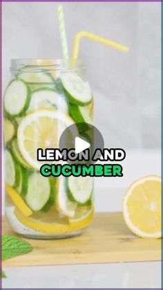 a jar filled with cucumbers and lemon slices