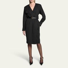 Saint Laurent wrap dress featuring a leather belt and gathered waist seam Surplice neckline Long sleeves; button cuffs Side slip pockets Sheath silhouette Knee length Hidden closure Viscose Professional cleaning recommended Made in Italy Formal V-neck Belted Dress With Tie Waist, Chic V-neck Midi Dress For Business, V-neck Belted Midi Dress For Office, Fitted V-neck Belted Dress For Daywear, V-neck Belted Dress For Work, Black Belted Business Dress, V-neck Belted Dress For Office, V-neck Belted Office Dresses, Classic Formal Belted Blazer Dress