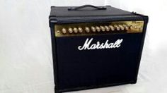 an amp that is sitting on top of a white sheet covered floor and has the words marshall written on it