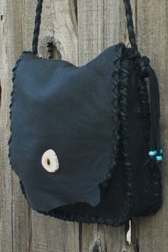 A simple black shoulder bag for your everyday needs. This handbag is made of soft black leather and measures 10 inches tall, 10 inches wide and 2.75 inches deep. It has an extra pocket inside, a pocket outside on the back and a 48 inch cross body strap. We can make this bag in a variety of colors of soft tanned cowhide ( see the last photo ). Just leave a note at check out or contact us. This item is MADE TO ORDER. You will not receive the piece you see in the photos, we will make one similar fo Black Hobo Bag With Cell Phone Pocket, Black Rectangular Hobo Bag With Cell Phone Pocket, Black Leather Satchel With Phone Pocket, Black Leather Satchel With Cell Phone Pocket, Black Saddle Bag With Leather Handles For Everyday, Black Soft Leather Hobo Satchel, Handmade Black Hobo Bag For Everyday, Black Soft Leather Saddle Bag For Everyday Use, Handmade Leather Black Hobo Bag