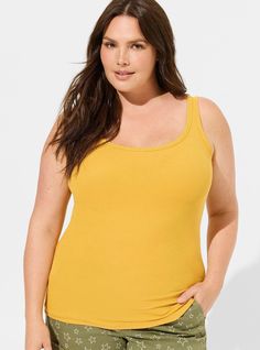 FIT Model is 5'11” wearing size 0. . Measures 30” from shoulder (size 2). Fixed straps. MATERIALS + CARE Cotton-modal blend ribbed knit fabric. . 57% cotton, 38% modal, 5% spandex. Machine wash cold. Tumble dry low. Imported. DETAILS Scoop neck. Sleeveless. . The best plus size women's cotton modal rib double scoop neck tank sleeveless & tops in mineral yellow made of cottonmodalrib. Rock your look from Torrid to Festivals like Coachella and Lollapalooza, a concert, a show, or just for fun! Blue Shirt With Jeans, Maurices Plus Size, Best Tank Tops, Ribbed Tank Top, Long Torso, Ribbed Tank Tops, Ribbed Tank, List Style, Shirt Jacket