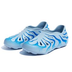 a pair of shoes with blue and white paint on them