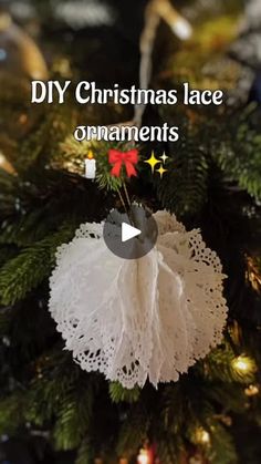 an ornament hanging from the top of a christmas tree with text that reads diy christmas lace ornaments