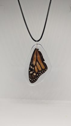 real monarch butterfly wing necklace, made with resin.  No butterflies were harmed, only found. necklace goes between 17 and 19 inches long Butterfly Wing Necklace, Bug Necklace, Fort Pierce, Accessories Bags Shoes, Insect Art, Bracelets Diy, Butterfly Wing, Wing Necklace, Beaded Bracelets Diy