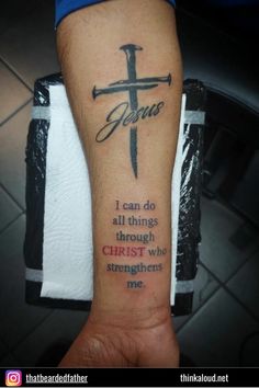 a person with a tattoo on their arm that says jesus i can do all things through christ who straightens me