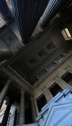 the ceiling in an old building has many columns