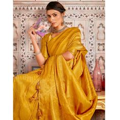 Mustard colored saree is prettified with beautiful weaving work as shown which makes it appear classy. This saree is made of art silk fabric which is accompanied with art silk blouse piece which you can customise as per your design/style. Women can buy this saree to wear for their party, festive, sangeet functions and homely events and ideal for any fashionista. Note:- The actual product may differ slightly in color and design from the one illustrated in the images when compared with computer or mobile screen. Elegant Slub Silk Blouse Piece For Saree, Traditional Diwali Slub Silk Pre-draped Saree, Festive Unstitched Slub Silk Pre-draped Saree, Elegant Yellow Pre-draped Saree With Zari Weaving, Anarkali Gold Raw Silk Saree, Slub Silk Pre-draped Saree For Eid Puja, Gold Anarkali Style Raw Silk Saree, Gold Anarkali Saree In Raw Silk, Handloom Slub Silk Pre-draped Saree For Diwali