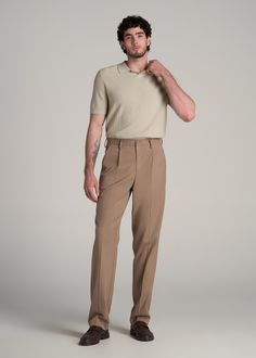 About Our Tall Men's Relaxed Tapered Pleated Trouser The Go-To Pants for Tall Men For the guy over 6' who values both style and comfort, these relaxed tapered pleated slacks for tall men are a game-changer. Designed specifically for the unique needs of tall guys, they offer a sophisticated look without sacrificing comfort. Embrace a modern style of men's tall pants that stands out in any setting.• Modern tapered fit• Versatile design for both casual and formal settings• Sustainably made with 68% Relax Fit Pants Men, Men’s Pleated Pants Outfit, Mens High Rise Pants, Tailored Trousers Mens, Relaxed Fit Pants Outfit Men, Men’s Pants Fashion, High Rise Pants Men, Light Business Casual, Men’s Pleated Trousers