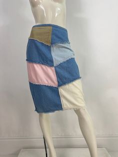 "90s patch denim skirt, 1990s patch jean skirt, corduroy jean skirt, size 7/8, 30\" waist  Measurement:  Waist 15\"/hip 19\"/length 24.5\" Mannequin measurements:  5'8\", bust 34\", waist 25\", hip 33\" Please note that vintage clothing sizes can vary greatly.  The Measurements provided  are approximate and are taken lying flat.  I suggest taking a similar garment from your wardrobe and measure it while lying flat.  This way you can compare measurements.  All of our pieces are genuine vintage. D Medium Wash Cotton Skirt With Patchwork, Cotton Skirt With Patchwork In Medium Wash, Spring Patchwork Denim Skirt, Retro Medium Wash Cotton Skirt, 90s Style Cotton Denim Skirt For Spring, 90s Style Cotton Skirt With Pockets, Vintage Denim Patchwork Skirt, Vintage Denim Skirt With Patchwork, 90s Style Blue Cotton Denim Skirt