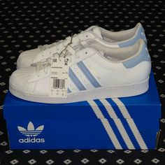 Brand New Adidas Superstar Sneaker In Rare Ambient White Sky Color Features Serrated 3-Stripes Mark, Iconic Shell Style Toe, And Box Logo. Adidas White Urban Custom Sneakers, All White Superstars, Mens Adidas Superstar Shoes, Adidas Superstar All White, Superstar 82 Adidas, Adidas Superstar 80s, Adidas Originals Ozweego, Adidas Originals Shoes, Adidas Originals Nmd