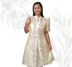 Organza Filipiniana Barong with Inner Dress Experience the elegance of Filipino tradition with the Organza Filipiniana Barong with Inner Dress, a sophisticated ensemble that merges classic design with contemporary style. This beautiful outfit features a sheer organza Barong, renowned for its light and airy texture, paired with a matching inner dress for added comfort and modesty. The Barong is crafted from high-quality organza, showcasing intricate embroidery that highlights traditional Filipino Elegant Dresses For Spring Celebration, Elegant Spring Dresses For Celebrations, Elegant Knee-length Ao Dai For Formal Occasions, Elegant Short Sleeve Dresses For Celebration, Traditional Knee-length Formal Dresses, Elegant Short Sleeve Ao Dai For Festive Occasions, Short Sleeve Dresses For Celebrations, Elegant Short Sleeve Dresses For Eid, Elegant Short Sleeve Dress For Ceremonies