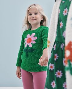 Elegantly soft sweater crafted in our beloved marshmallow yarn, complete with artwork they'll love to wear on every adventure. • Cozy sweater yarns • Easy pullover fit • Like new wash after wash 100% recycled polyester Soft ribbed neck, cuffs and hem Imported. Girl, Girls Clothes, Sweaters & Hoodies, Back to School Outerwear, Back to School clothes. | Marshmallow Sweater - Size 10 - Daisy Pop On Green - Back to School - Hanna Andersson Playful Long Sleeve Soft Knit Sweater, Playful Crew Neck Knitted Sweater, Playful Knitted Long Sleeve Tops, Playful Winter Sweater For Playtime, Playful Winter Soft Knit Sweater, Playful Fall Sweater For Playtime, Playful Knitted Sweater For Spring, Playful Knitted Spring Sweater, Playful Spring Knitted Sweater