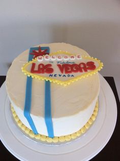 a birthday cake with the las vegas sign on it