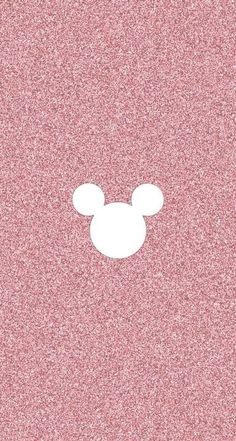 mickey mouse silhouette on pink glitter background