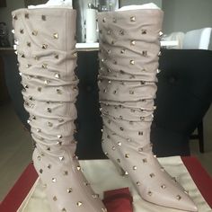 Valentino Garavani Smooth Napa Leather Rockstud Boots In The Color Poudre. Brand New With All Original Packaging Including Box/Dustbag/Valentino Card/Extra Heels, Tried On, Never Worn. Beautiful Nude Color With 60mm Heels So Very Comfortable Height. Price Pretty Firm But Feel Free To Make A Reasonable Offer. Size 38 1/2, I’m Typically 7-7 1/2. Came With Some Inevitable Rockstud Dents, Please See Pics. Cross Posted For $750. Designer Beige Boots For Evening, Beige Leather Party Boots, Beige Leather Evening Boots, Designer Spring Boots, Designer Beige Calf Leather Boots, Luxury Beige Calf Leather Boots, Designer Beige Almond Toe Boots, Elegant Cream Boots With Flat Heel, Elegant Beige Boots With Flat Heel