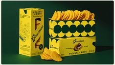 two boxes of potato chips next to each other on a green background with an open box