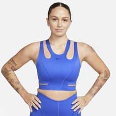 Feel fierce in whatever you do in this strappy sports bra. Its sleek, midweight fabric feels supportive in all the right places. With sweat-wicking tech and plenty of cutouts, you can stay cool and dry whether you're powering through a workout or busting out some moves on the dance floor. Nike Sports Bra With Built-in Padding, Nike Activewear With Built-in Padding For Sports, Nike Activewear With Built-in Bra For Workout, Nike Sweat Resistant Activewear For Yoga, Nike Sweat-resistant Activewear For Yoga, Sporty Nike Activewear, Nike Nylon Yoga Activewear, Nike Go-dry Sports Bra For Gym, Nike Nylon Activewear For Yoga