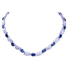 An exclusive contemporary design, so glamour enchanting, refined details, from Italian designer. Necklace come in 18k gold with 17 pieces of natural Ceylon sapphires, oval cut, fine quality, 25.68 carats, and 144 pieces of natural diamonds in round brilliant cut, 5,11 carats, F color VS clarity. It is a very piece of art and high jewelry. An expression of Italian beauty and craftsmanship. Handcrafted by artisan goldsmith. Excellent manufacture and quality. Complete with AIG certificate. Whosale price. Note: on my shipment, customers not pay taxes. 18k Gold Necklace, Italian Beauty, Designer Necklace, Ceylon Sapphire, Italian Designer, Multi Strand Necklace, Sapphire Diamond, High Jewelry, Multi Strand