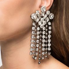 Enhance your look with these stunning crystal tassel clip earrings, designed for women who want to add a touch of sophistication to their ensemble. Perfect for weddings, parties, or as a thoughtful gift, these earrings are a beautiful addition to any jewelry collection. Key Features: Material: Crafted with high-quality rhinestones and copper Comfortable: No piercing required for effortless wear Geometric Design: The elegant geometry adds a modern touch to any outfit Trendy Style: Stay on-trend w Jewelry Geometry, Earrings No Piercing, Piercing For Women, Bridal Clip, Tassel Earing, Clip Earrings, Elegant Earrings, Accessories Rings, Shape Patterns