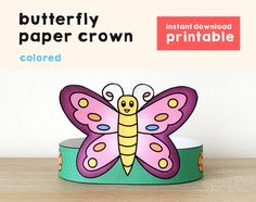 a paper crown with a butterfly on it and the words,'butterfly paper crown colored '