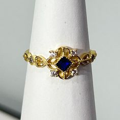 14k Gold Plated - Hypoallergenic - Everyday Wearable - Incredibly Sturdy - Vibrant Color - Looks Like Solid Gold For A Fraction Of The Price. S925 Sterling Silver - Solid Sterling Silver - Very Reflective - Hypoallergenic - Long Wear - Shine Can Be Restored With Polish Cloth Comes In A Dust Bag With A Polish Cloth. Sapphire Diamond Cut Promise Ring Jewelry, Dainty Sapphire Jewelry With Diamond Accents, Elegant Royal Blue Sapphire Ring As Gift, Elegant Royal Blue Sapphire Ring Gift, Adjustable Blue 14k Gold Rings, Gold Sapphire Jewelry With Diamond Cut, Dainty Gold Sapphire Ring In Sterling Silver, Gold Sapphire Ring In Sterling Silver, Dainty Style, 14k Gold Blue Jewelry With Diamond Accents