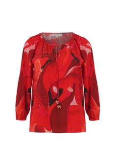 The Rouge Casa top, in our staple staccy red print, features hand-highlighted details all over and gathered sleeves. The vibrant print and intricate handwork, combined with the stylish sleeve design, make this top both bold and elegant. Red Tropical Print Top With Camp Collar, Red Long Sleeve Top With All Over Print, Red Long Sleeve Tops With Printed Motifs, Luxury Red Printed Tops, Rococo Sand, Red Printed 3/4 Sleeve Top, Hemant And Nandita, Cami Nyc, Bodysuit Blouse