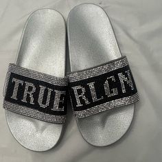 The Sandals Are Brand New They Were Never Worn. Dr26aa Trendy Silver Flat Sandals, Trendy Silver Open Toe Sandals, Trendy Silver Sandals For The Beach, Silver Sandals With Bling And Round Toe, Silver Bling Sandals With Round Toe, Silver Round Toe Synthetic Sandals, Silver Slip-on Sandals For Party, Casual Silver Round Toe Sandals, Silver Open Toe Synthetic Sandals