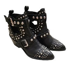 Gently Used, Worn Twice Beautiful Black Leather Metal Studded Booties With Side Buckle. These Look Fabulous With Any Outfit, From Denim To Dress Attire. Sure To Fetch Many Compliments. Low Heel Boots With Buckle Closure For Party, Edgy Spring Heeled Boots With Buckle Closure, Party Boots With Buckle Closure And Low Heel, Edgy Spiked Boots For Fall, Punk Boots With Studded Rubber Outsoles For Fall, Edgy Boots With Buckle Closure For Spring, Edgy Spring Boots With Buckle Closure, Black Ankle Heeled Boots With Rivets, Edgy Spring Moto Boots With Pointed Toe