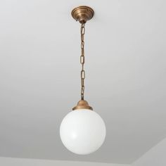 a light fixture hanging from the ceiling in a room