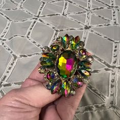 Gorgeous Adjustable Statement Crystal Ring. Brand New Without Tag! Has Beautiful Green/Pink Crystals That Change Colors Depending On The Light. Iridescent Brooch Jewelry For Party, Multicolor Party Jewelry With Brooch, Multicolor Party Ring Jewelry, Rainbow Ring For Party Jewelry, Rainbow Ring For Parties, Rainbow Party Ring Jewelry, Ring Color, Crystal Ring, Crystal Rings