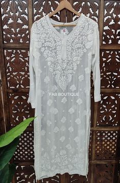 Description Material : Viscose  Wash Care : Hand Washable Kurti Length : 46-47 inches Occasion : Casual Wear Touch and Feel - Comfortable and Soothing Sleeve-3/4 Sleeves Package Contains : 1x Kurti Bohemian Georgette Kurta With Zari Work, Designer White Blouse Piece With Chikankari Embroidery, Long Kurta With Chikankari Embroidery For Summer, Summer Wedding Kurta With Chikankari Embroidery, Fitted White Blouse For Eid, Summer Bohemian Kurta With Self Design, Bohemian Semi-stitched Blouse With Chikankari Embroidery, White Long Sleeve Blouse With Chikankari Embroidery, Long Georgette Kurta With Chikankari Embroidery