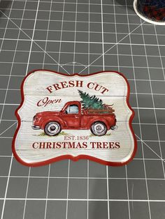 a wooden sign that says fresh cut christmas trees