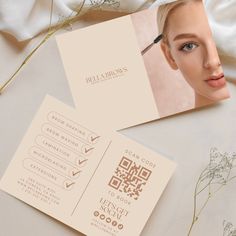 two business cards with an image of a woman's face