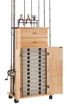 a large wooden box with many different tools in it's storage compartments and wheels