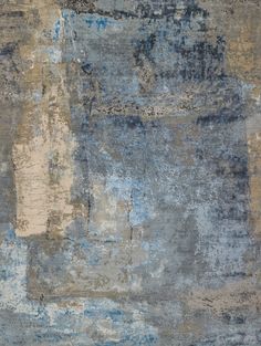 an abstract rug with blue and gray colors