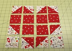 the block is made up of red and white polka dot fabric, which has been cut into squares