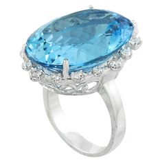 Stamped: 14K Total Ring Weight: 7.2 Grams Topaz Weight 33.57 Carat (22.75x18.00 Millimeters)Diamond Weight: 0.55 carat (F-G Color, VS2-SI1 Clarity )Face Measures: 27.90x21.50 Millimeter SKU: [600818] 14k White Gold Diamond Ring, White Gold Diamond Rings, White Gold Diamonds, Gold Diamond, Topaz, Diamond Ring, White Gold, Engagement Rings, Color