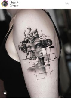 a woman's arm with an abstract tattoo on it