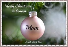 a pink ornament hanging from a christmas tree with the words, merry christmas in heaven