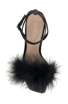 Turn up the volume in your next party look with this strappy sandal flaunting a tuft of fluffy faux feathers and a flared heel. 3" heel Adjustable ankle strap with buckle closure Memory foam-cushioned footbed Textile faux-feather and synthetic upper/synthetic lining and sole Imported Feathered Open Toe Evening Sandals, Feathered Open Toe Sandals For Party, Evening Open Toe Sandals With Feathers, Evening Sandals With Feather Trim And Ankle Strap, Chic Sandals With Feather Trim, Formal Open Toe Sandals With Feathers, Party Sandals With Feathers And Open Toe, Chic Feather Trim Sandals, Chic Sandals With Feathers For Summer