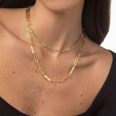 Size Guide Safety Policy Care InstructionsA gold chain necklace perfect for layering, this piece can be customized with dainty charms to create a unique look each time you wear it. This is a sign to add this to your collection (or give as a gift to your loved one).14K Solid Gold: 14K solid gold is a timeless metal. It keeps its look forever without oxidizing or changing its color, making it a must-have in your collection.Customize Me! Personalize your chain with 1-4 charms.How To Make It Yours: 14k Gold Double Chain Link Necklace, Elegant Double Chain 14k Gold Necklace, Dainty Cable Chain Necklace For Everyday Luxury, 14k Gold Double Chain Necklace For Everyday, Everyday 14k Gold Double Chain Necklace, Dainty Double Chain Yellow Gold Charm Necklace, Dainty Yellow Gold Charm Necklace With Double Chain, Dainty Yellow Gold Double Chain Charm Necklace, Timeless Gold Plated Paperclip Chain Necklace