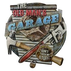 an old man's garage sign with tools