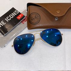 Beautiful Blue Ray Ban Sunglasses! So Fun For Every Day Wear. Comes With Case And Unopened Cleaning Cloth. Minor Scratches Shown In Pictures. A Great Deal :) Casual Blue Tinted Aviator Sunglasses, Blue Polarized Aviator Sunglasses For Beach, Blue Aviator Sunglasses With Tinted Lenses For Beach, Blue Mirrored Aviator Sunglasses For Beach, Blue Tinted Aviator Sunglasses For Beach, Blue Aviator Sunglasses With Gradient Lenses For Beach, Blue Aviator Sunglasses For Beach, Blue Aviator Sunglasses For Summer Beach, Blue Aviator Sunglasses For Beach Summer