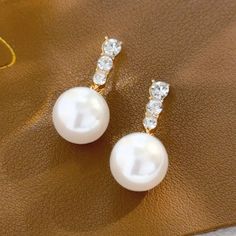 Brand New Women's Hanging Pearl Diamond Earrings 14k Gold Plated 925 Sterling Silver (Stamped) Genuine 2ct Lab Created Diamonds Real Natural Freshwater Pearls Measurements 1" Tall .5" Wide Retail Price $350 Buy With Confidence From A Top Rated Seller W/ A 99% + Rating! A0113 (Id-1707-) White Pearl Earrings With Diamond Accents For Anniversary, White Round Pearl Earrings With Diamond Accents, Classic White Earrings With Diamond Accents, Elegant White Earrings With Diamond Accents, Classic White Pearl Earrings With Diamond Accents, White Dangle Pearl Earrings With Plating, White Plated Dangle Pearl Earrings, White Plated Drop Earrings, Elegant White Bridal Earrings With Prong Setting