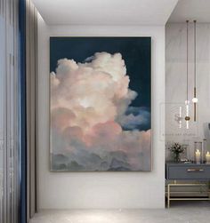 a painting hanging on the wall in a room