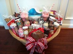 a basket filled with lots of food on top of a wooden floor