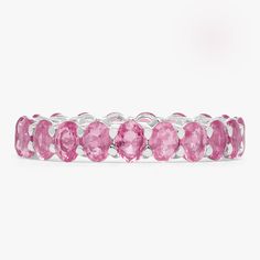 We absolutely adore the pink sapphire eternity band and we know you will too! Perfect for everyday dainty wear or to add depth to your ring stack. This ring is a must have in your jewelry box! Available in two sizes, you're sure to find the perfect ring for you. Please note: Eternity Bands can never be resized. This item is FINAL SALE upon purchase. Whats Available: MINI: Approx. 4.77 ctw (Carat Weight based on a standard size 7) MAMA: Approx. 6.34 ctw (Carat Weight based on a standard size 7) M Pink Oval Stackable Jewelry, Pink Oval Stackable Rings, Pink Round Band Eternity Band As Gift, Pink Round Eternity Band As Gift, Pink Stackable Eternity Band As Gift, Pink Round Band Eternity Ring As Gift, Pink Sapphire Stackable Rings With Round Band, Pink Stackable Eternity Band For Anniversary, Pink Stackable Rings In Fine Jewelry Style