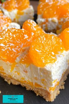 there are several pieces of cake with oranges on it